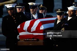 Rudolph Anderson carrying Jimmy Carter's casket